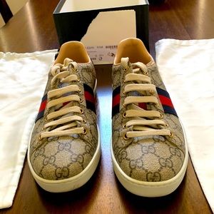 Gucci tennis shoes. Only worn out once. Comes with Gucci shoe covers.